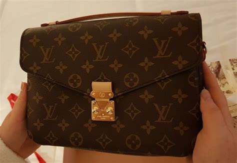 como distinguir un bolso louis vuitton original|bolso louis vuitton usado.